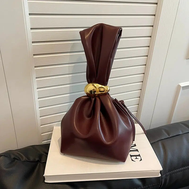 Metallic Accent Knotted Leather Handbag