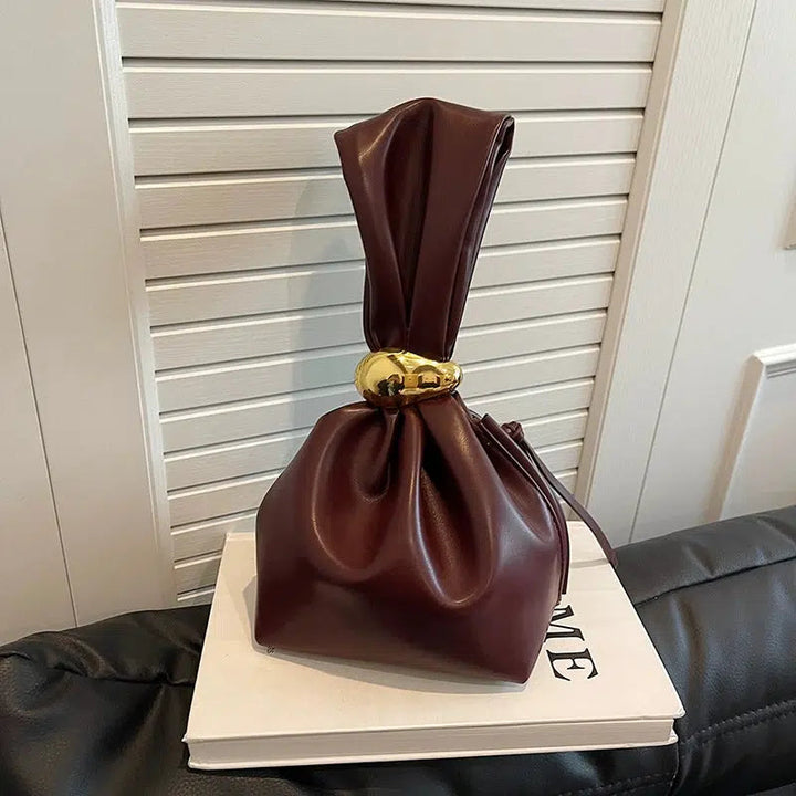 Metallic Accent Knotted Leather Handbag