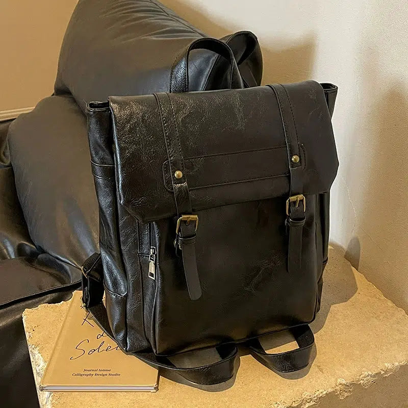 Multi-compartment Leather Buckle Backpack