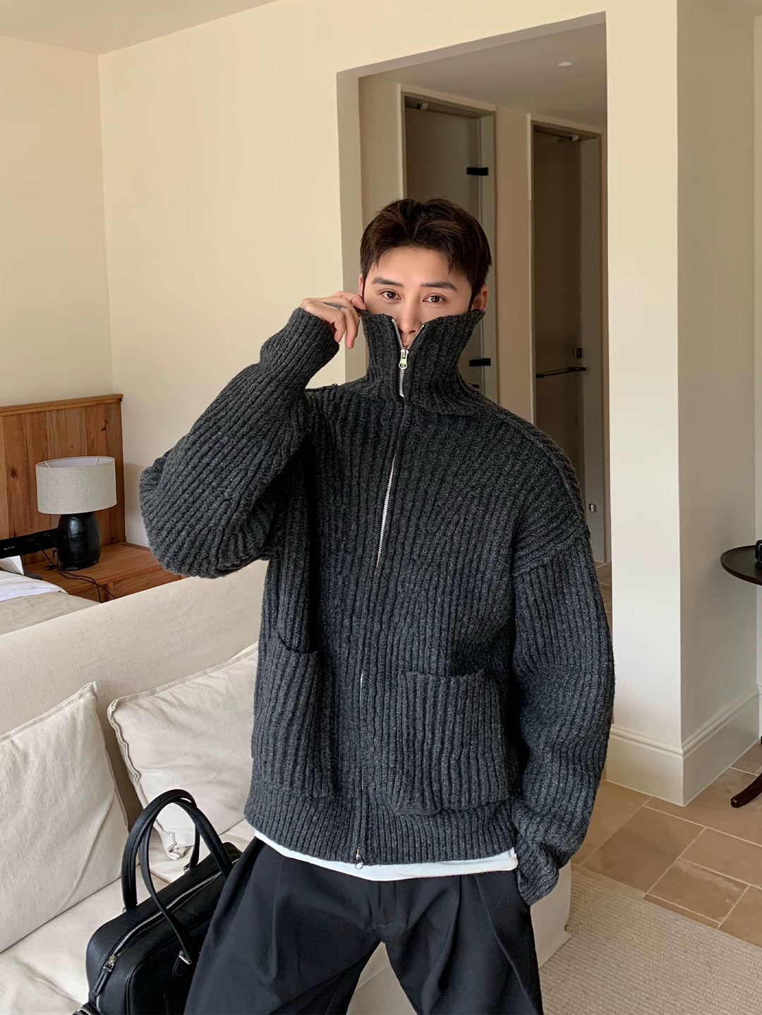 Cárdigan de punto con cremallera y cuello alto acanalado 