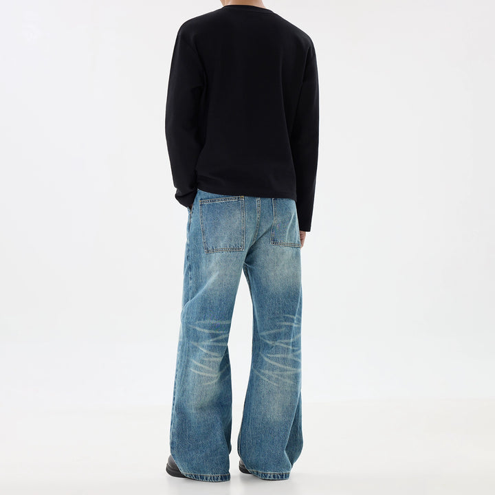 Jeans pantaloni dritti a gamba larga strappati 