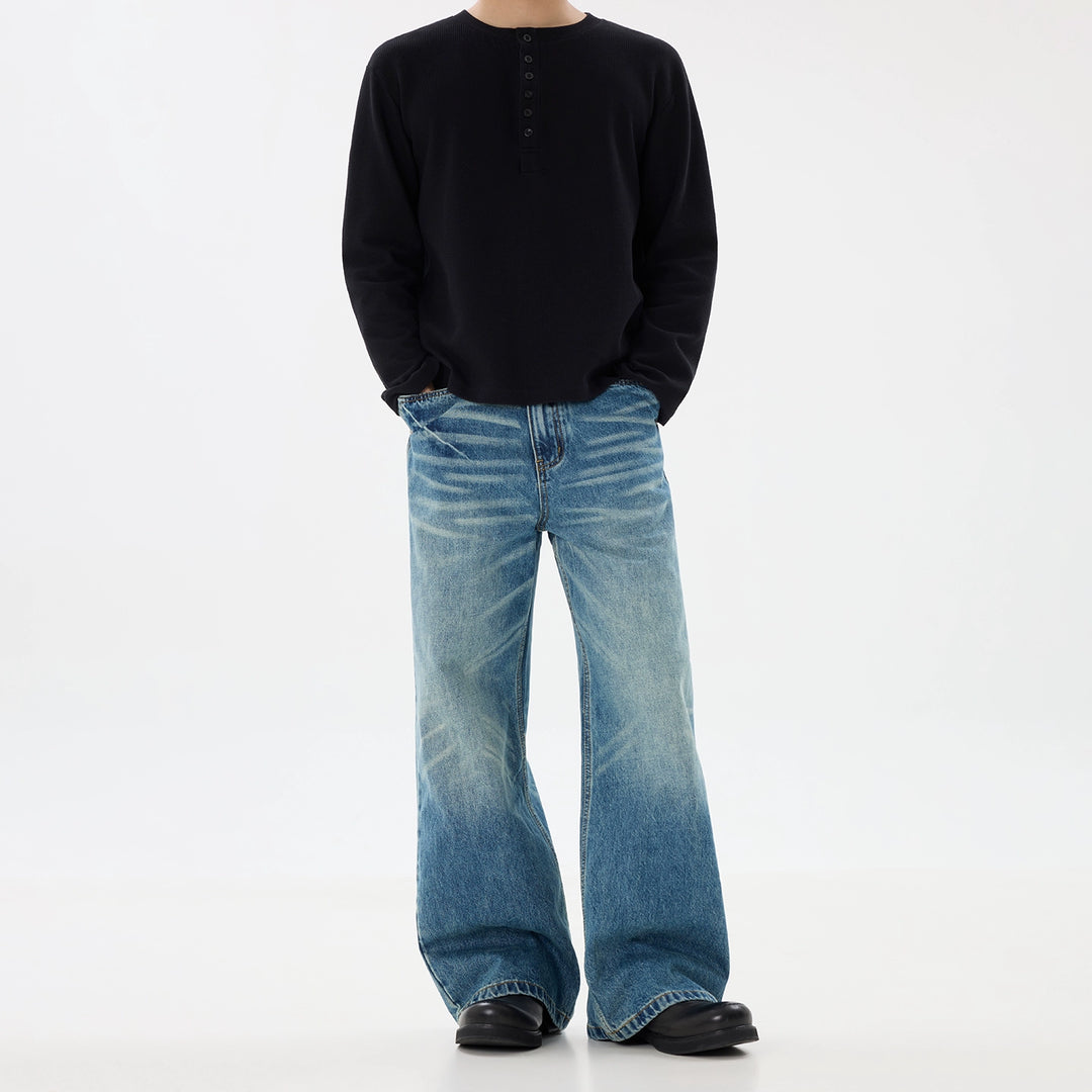 Jeans pantaloni dritti a gamba larga strappati 