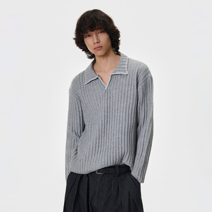 Maglione a V in maglia cucito a mano 