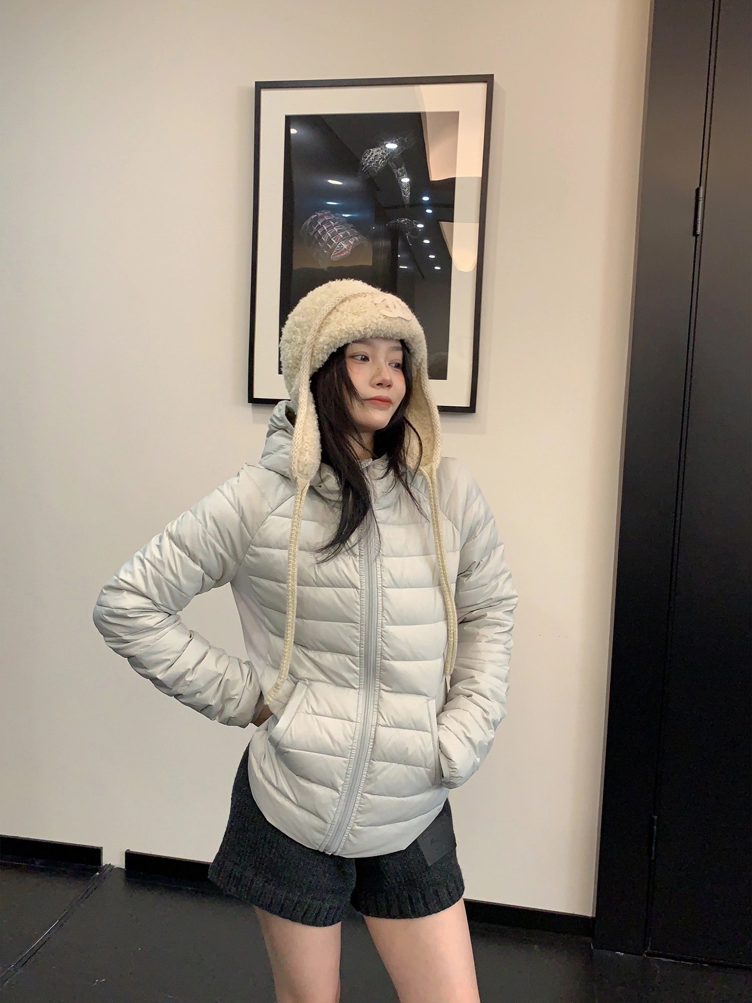 Giacca a vento leggera con cappuccio imbottita in piuma 