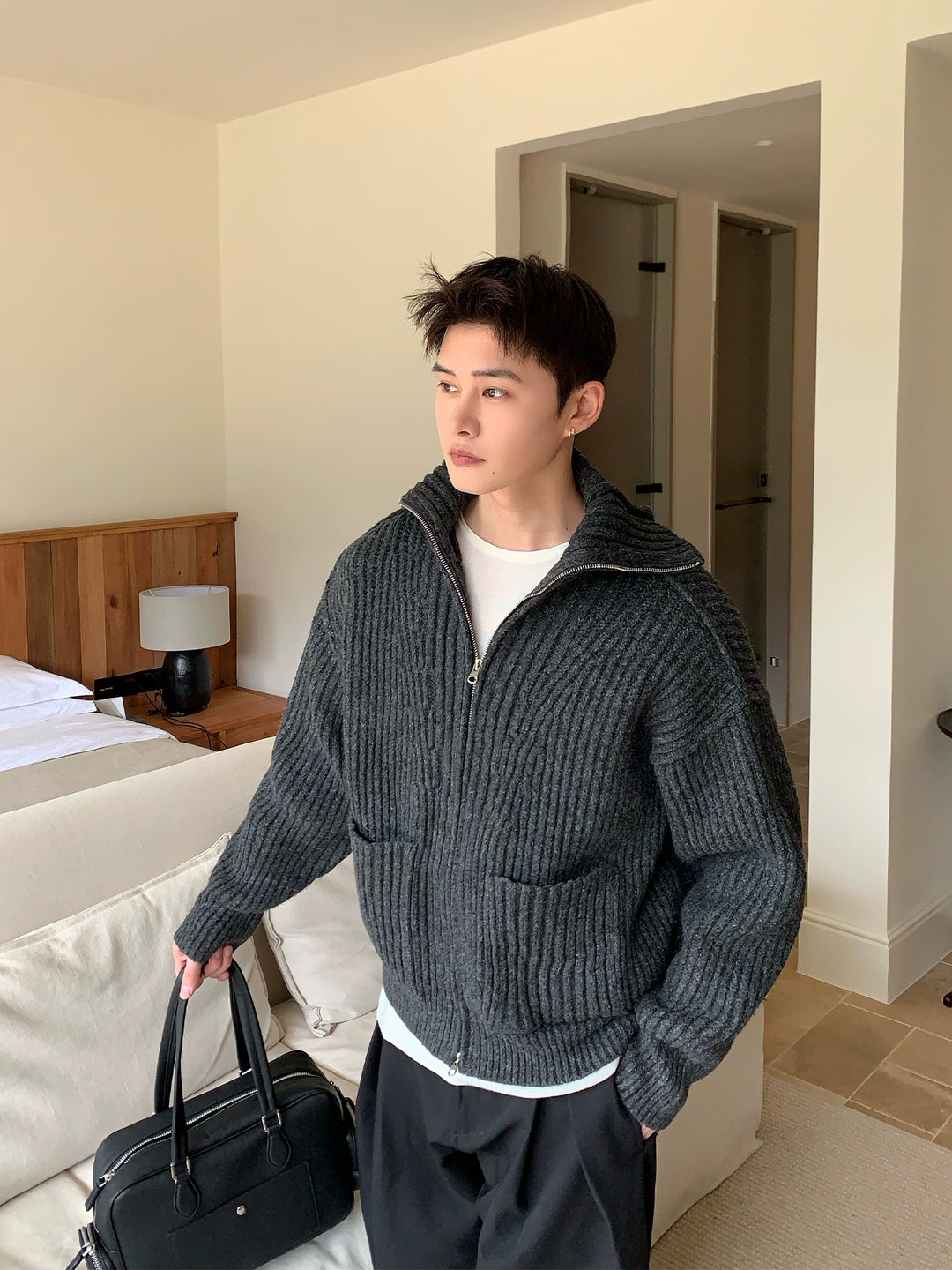 Cárdigan de punto con cremallera y cuello alto acanalado 