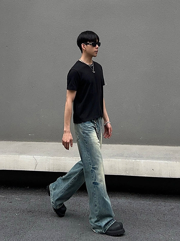 Jeans holgados de tiro acampanado desgastados 