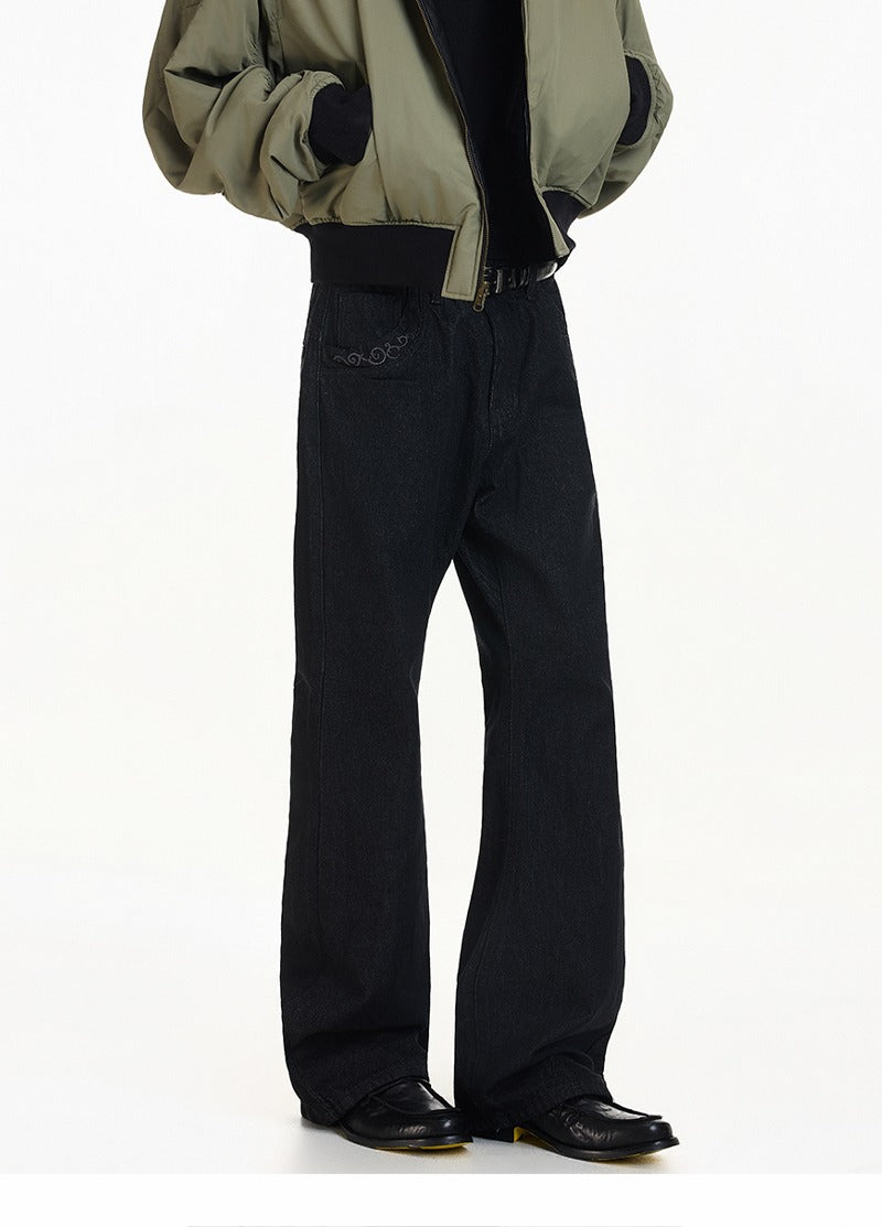 Texturované vyšívané kalhoty z hrubého denimu s rozšířenými nohavicemi 