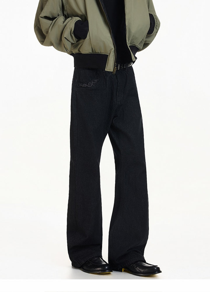 Texturované vyšívané kalhoty z hrubého denimu s rozšířenými nohavicemi 