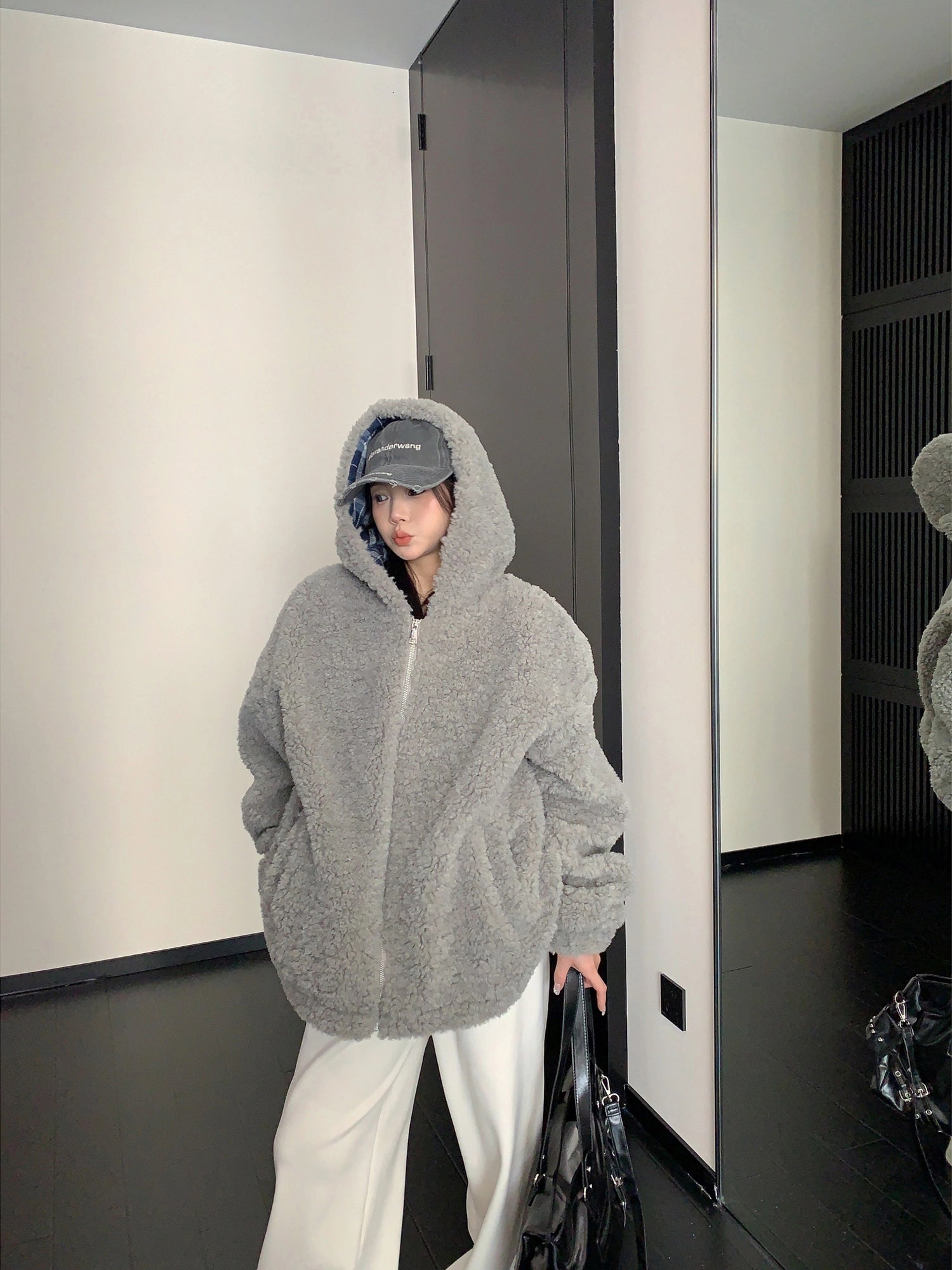 Giacca invernale con zip in pile con cappuccio 