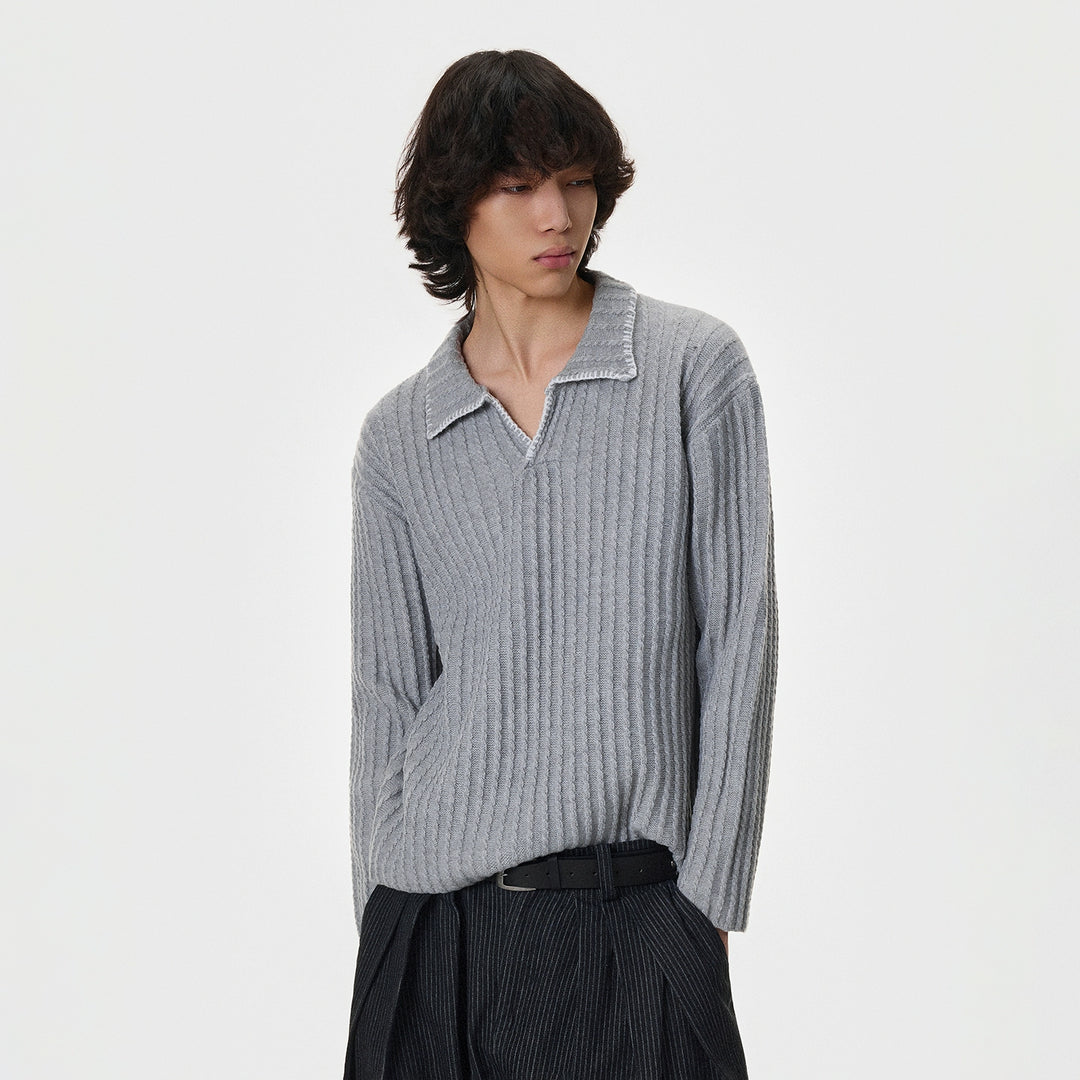 Maglione a V in maglia cucito a mano 