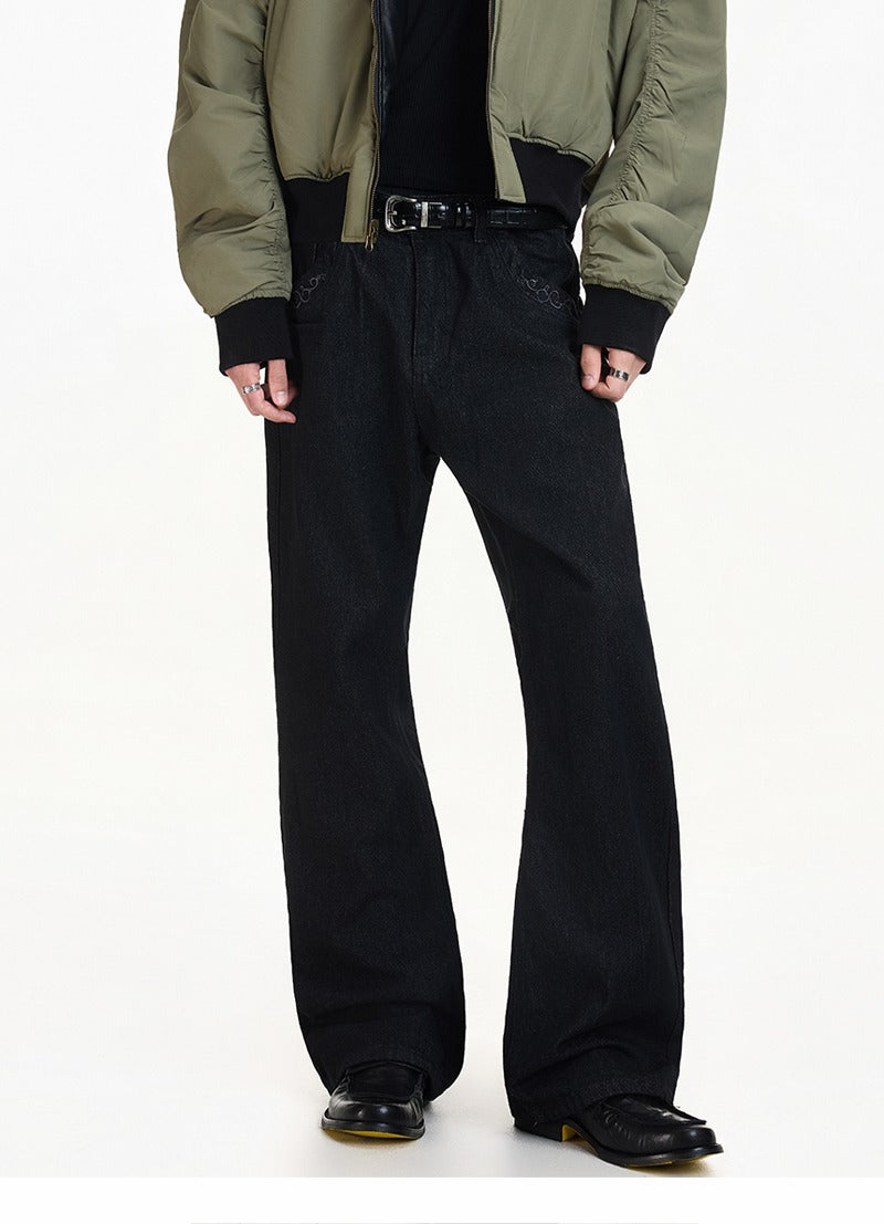 Texturované vyšívané kalhoty z hrubého denimu s rozšířenými nohavicemi 