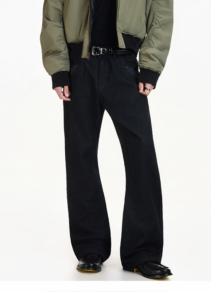 Texturované vyšívané kalhoty z hrubého denimu s rozšířenými nohavicemi 