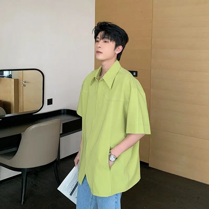 Oversized Polo Shirt with Piping Detail