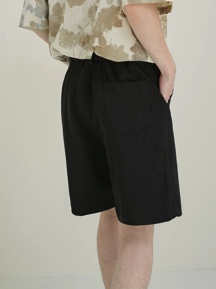 Relaxed Fit Pleated Shorts