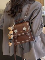 Star Accents Compact Leather Backpack