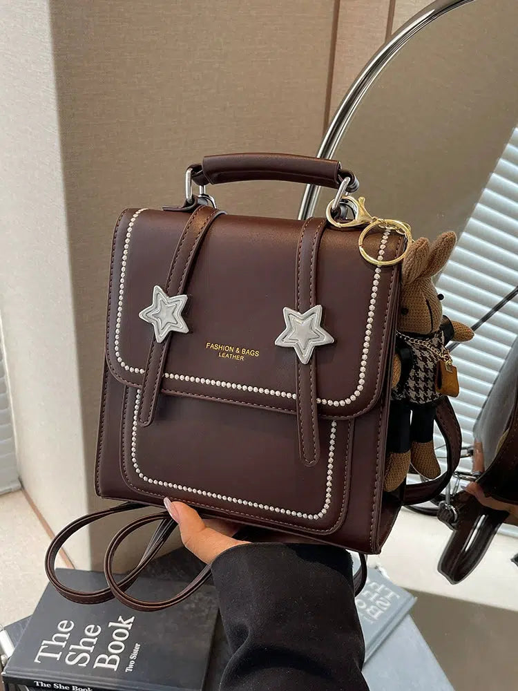 Star Accents Compact Leather Backpack