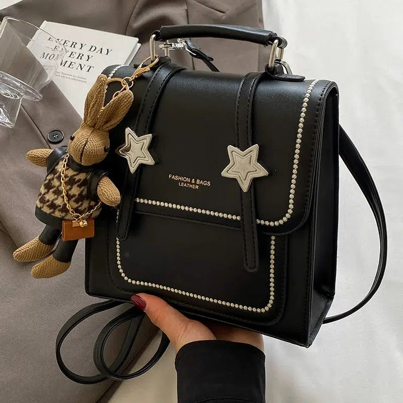 Star Accents Compact Leather Backpack