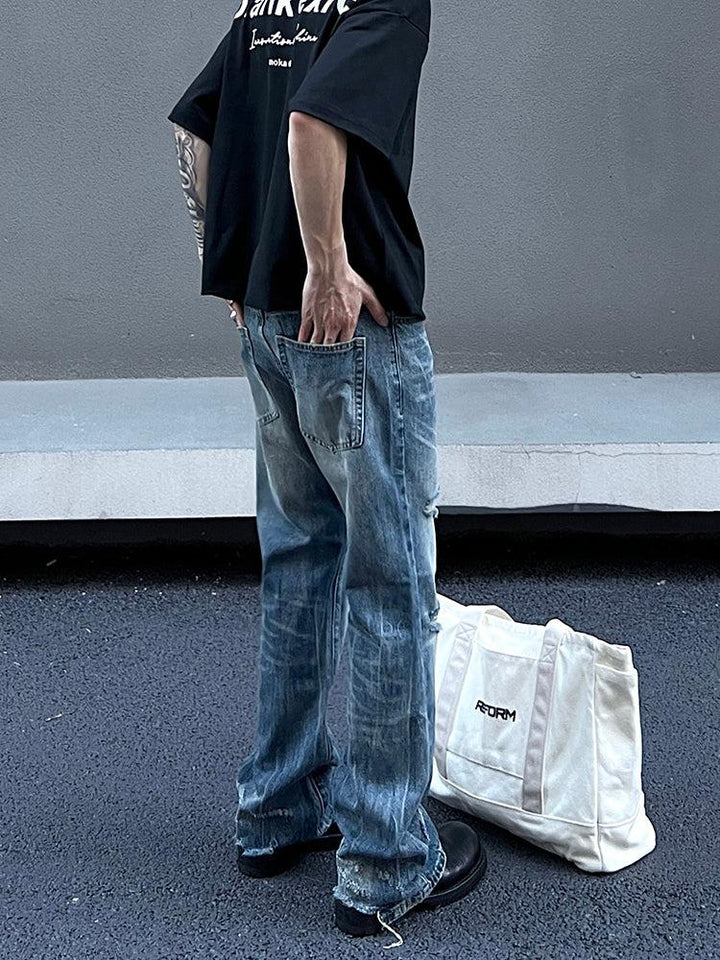 Washed Ripped Blue Jeans