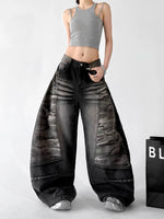 Curved Wide-Leg Distressed Denim Pants 3