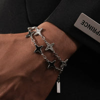 Bracciale con catena di perline a stella a quattro punte 