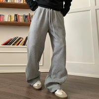 سروال رياضي بطول الأرض مع شفرات منحنية فضفاضة 