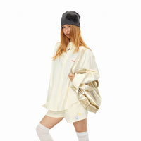 Ensemble chemise à fleurs brodées rayées et shorts 