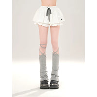 Gonna mini a strati con volant e coulisse 