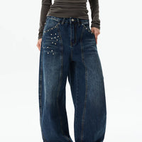 بنطال جينز بتفاصيل من الكريستال واسع الساق 