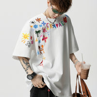 手描きプリントのゆったりフィットTシャツ 