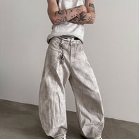 Pantalones de pierna ancha desgastados y lavados 