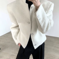 Veste courte en laine avec épaules rembourrées 