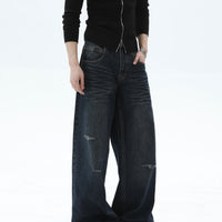 جينز واسع الساقين بتصميم عتيق ومهترئ 