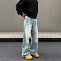 سروال جينز واسع الساق بتفاصيل سلسلة 