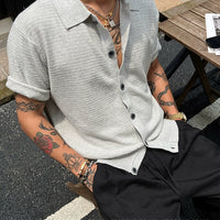 Camisa de botão de lapela de manga curta tricotada 