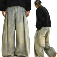 Pantalons en denim déchirés à jambes larges 