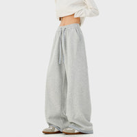 سروال رياضي بخصر مطاطي وسحب واسع الساقين 