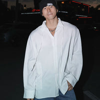 قميص بولو بأكمام طويلة مزين بخطوط 