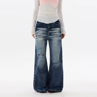 بنطال جينز واسع الساق ممزق 