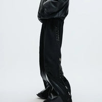 بنطلون بتفاصيل جلد صناعي مزخرف واسع الساق 