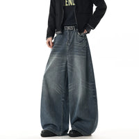 بنطال جينز واسع جداً بتصميم ممزق ومغسول 