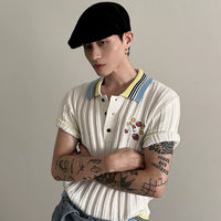 花柄刺繍のニットポロシャツ 