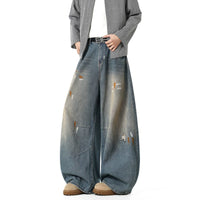 سروال جينز واسع الساق مع بقع الحبر 