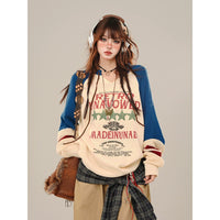 Üniversite Tarzı Bol Örgü Grafik Kazak 