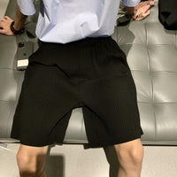 Shorts plissés longs 