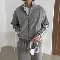 Conjunto de sudadera con cremallera deportiva y pantalones 