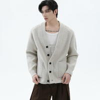 سترة محبوكة بأزرار مع جيوب مدمجة 