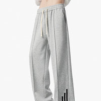 Pantalones deportivos sueltos retro de tres rayas 