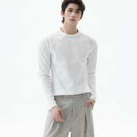 تي شيرت طويل الأكمام بقصة ضيقة من قماش الوافل 