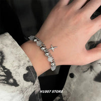 Bracciale a doppio strato in acciaio titanio con charm a stella 