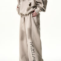 Pantalons de survêtement graphiques délavés à jambes larges 